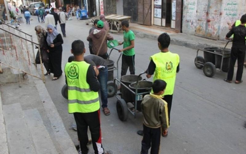 بالصور: حماس تنظم حملة "انتماء وعطاء" بدير البلح