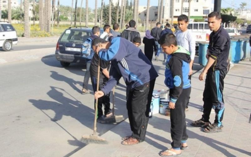 بالصور: حماس تنظم حملة "انتماء وعطاء" بدير البلح