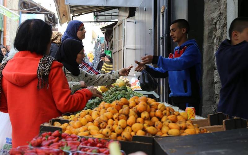 صور: فاكهة الأسكدنيا بأسواق القدس