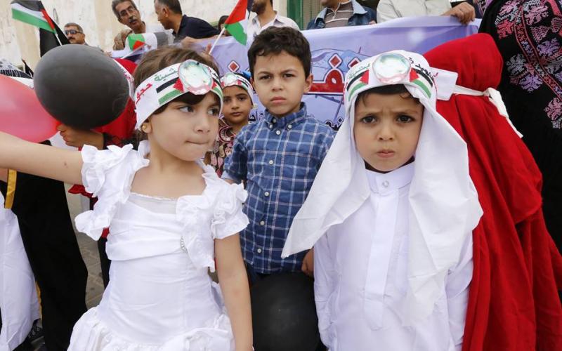 بالصور: أطفال خانيونس يحيون ذكرى النكبة