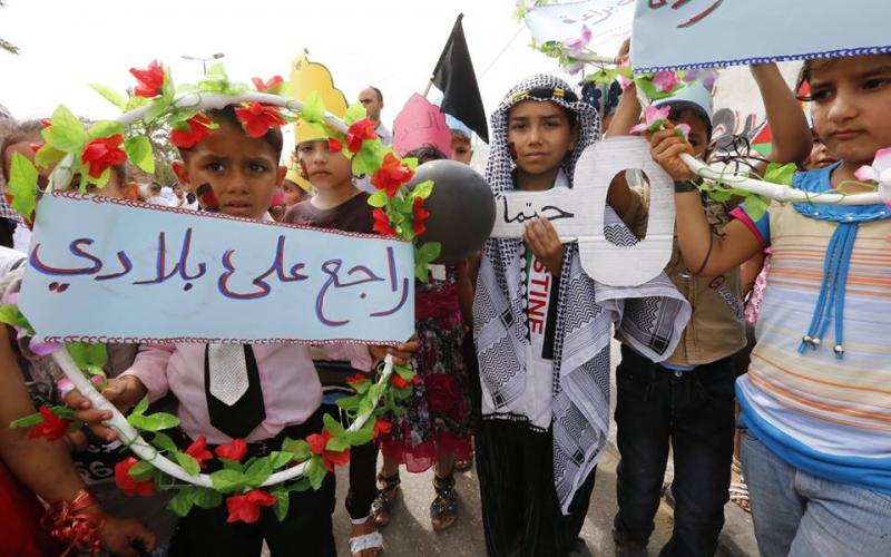 بالصور: أطفال خانيونس يحيون ذكرى النكبة