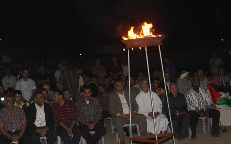 صور: إشعال شعلة ذكرى النكبة الـ 66 بالمغازي‎