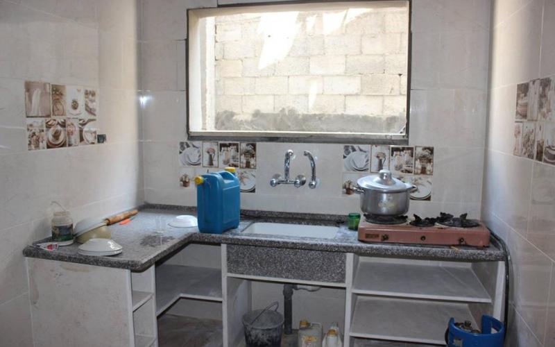 بالصور: مشروع لترميم منازل الأسر الفقيرة بغزة