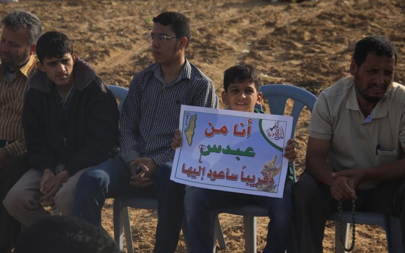 بالصور: القسام يتسلم مفتاح العودة بخانيونس