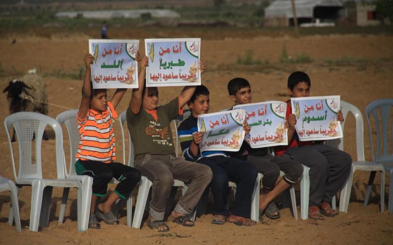 بالصور: القسام يتسلم مفتاح العودة بخانيونس