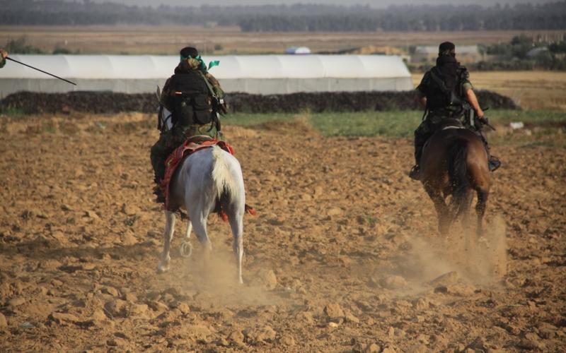 بالصور: القسام يتسلم مفتاح العودة بخانيونس