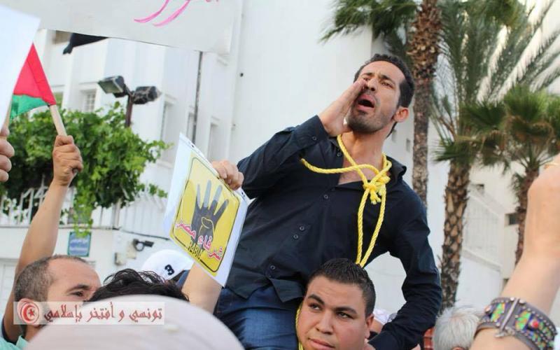 صور: وقفة بتونس ضد محاكمة مرسي