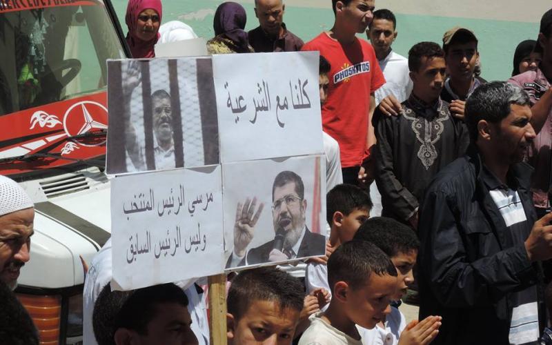 صور: مسيرة بالمغرب ضد الأحكام على مرسي