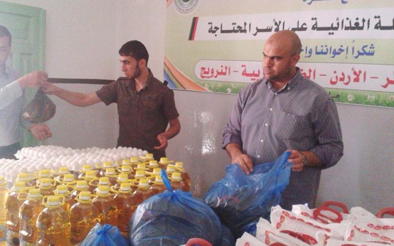 بالصور: جمعية الزيتونة توزع مساعدات للفقراء