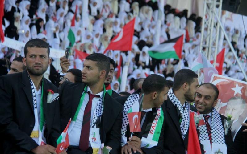 صور: حفل زفاف 4000 عريس بغزة