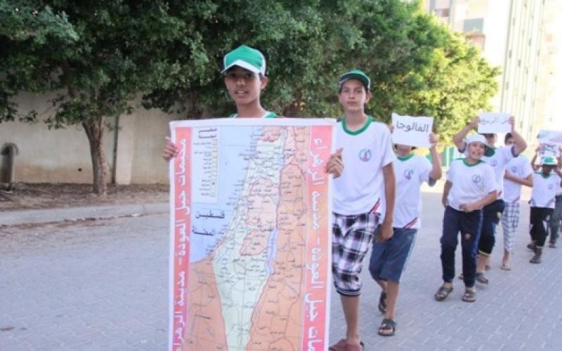 بالصور: خريطة فلسطين بأجساد "جيل العودة" بالوسطى