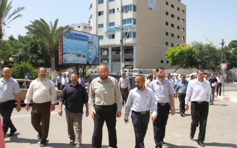 صور: موظفو غزة يعتصمون أمام بنك فلسطين