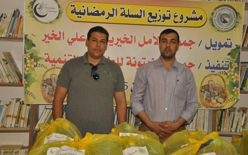 بالصور: جمعية الزيتونة توزع طرود غذائية للفقراء