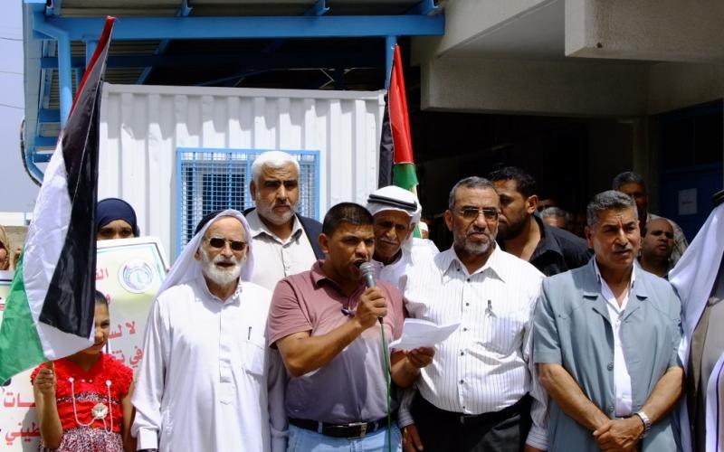 بالصور: وقفة لرفض تقليص خدمات الوكالة بالوسطى