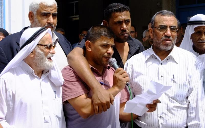 بالصور: وقفة لرفض تقليص خدمات الوكالة بالوسطى