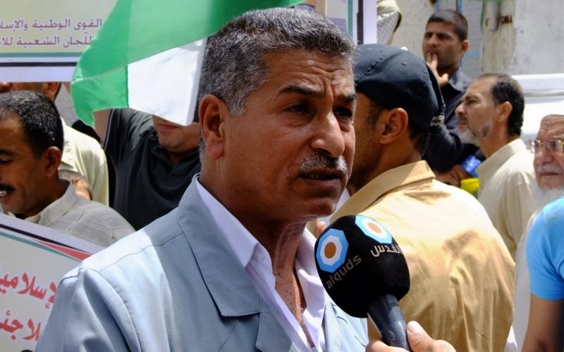 بالصور: وقفة لرفض تقليص خدمات الوكالة بالوسطى