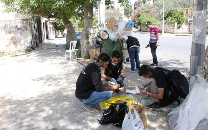 صور: لوحات فنية على حاويات النفاية بنابلس