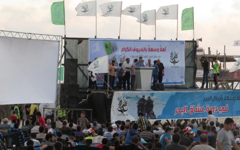 بالصور: حماس تخرج 1000 فتى بمخيم "عشاق البحر"