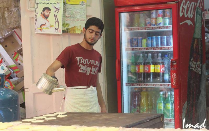 صور: أجواء رمضان في أسواق الخليل