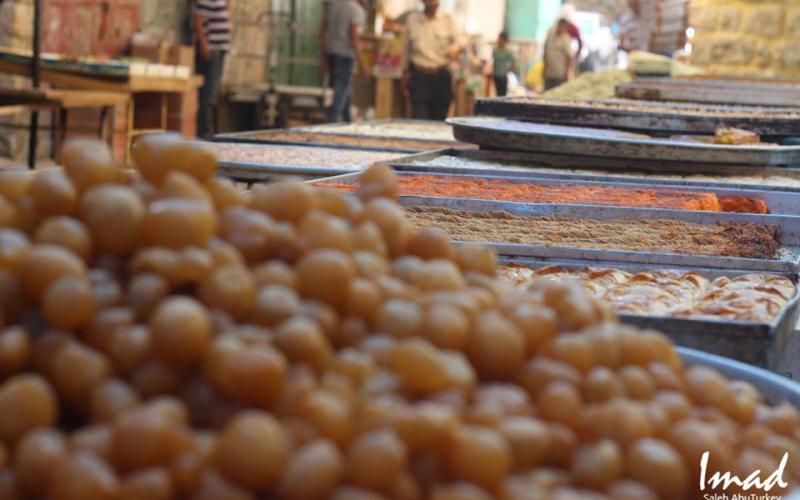 صور: أجواء رمضان في أسواق الخليل