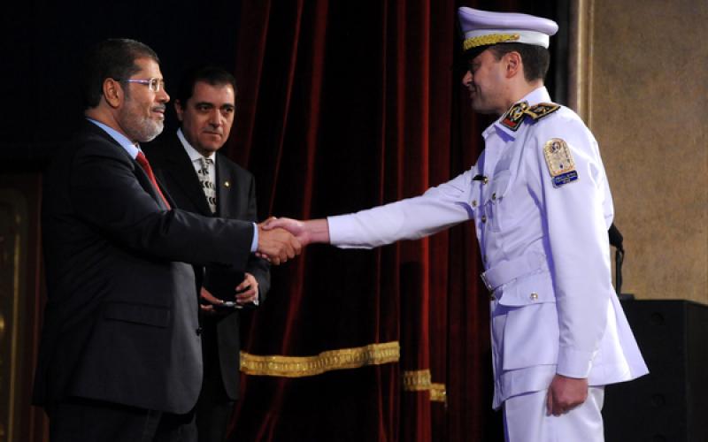 صور.. مرسي يشارك في تخريج دورة للداخلية