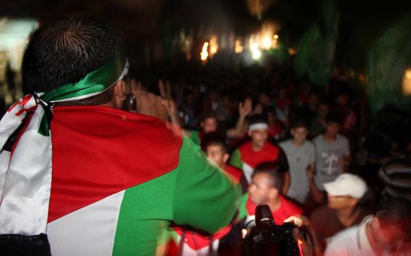 بالصور: حماس تنظم مسيرة ضد العدوان