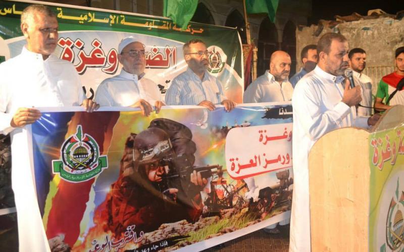 بالصور: حماس تنظم مسيرة ضد العدوان