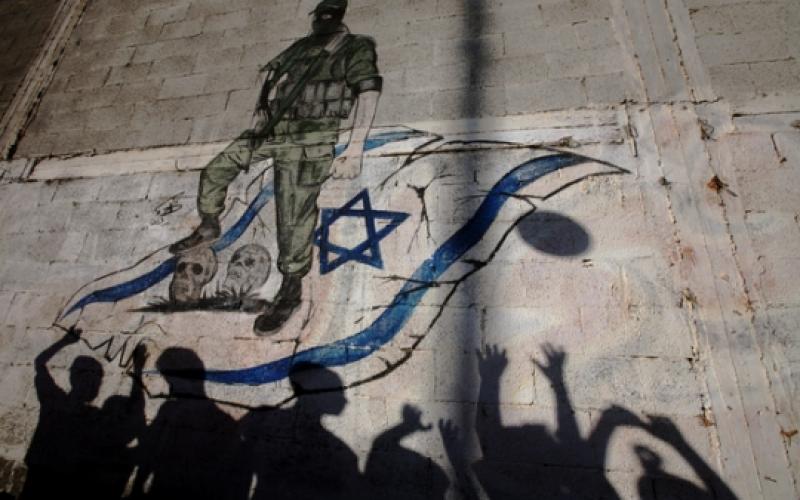 جدارية تصور مقاتل فلسطيني بجباليا