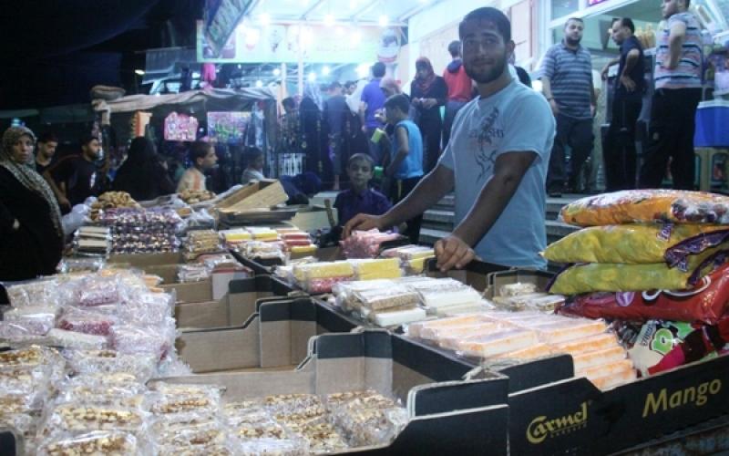 صور.. بهجة العيد في أسواق غزة وعيون أطفالها