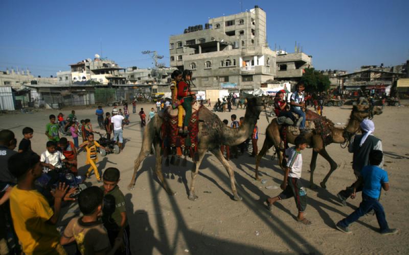 صور: فرحة العيد توحد أطفال غزة والضفة