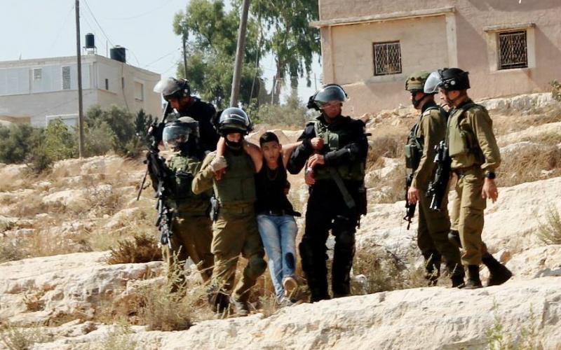 بالصور: الاحتلال يختطف طفلاً بعد إصابته بالضفة