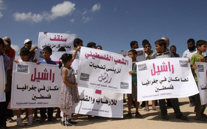 بالصور..وقفة احتجاج ضد تبرئة قتلة كوري برفح