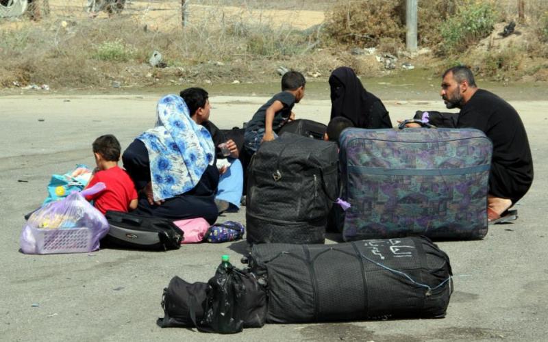 صور: معاناة الفلسطينيين على معبر رفح