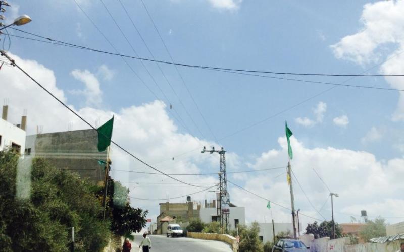 صور: رايات حماس تزين شوارع "مادما" بنابلس