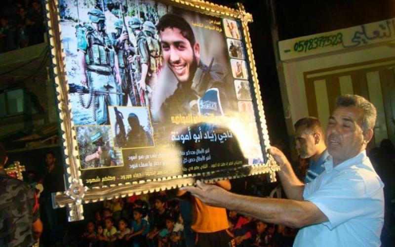 بالصور: الكشافة تكرم أبناءها الشهداء‎ بالنصيرات