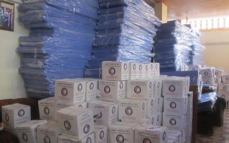 صور: الشرطة توزع مساعدات لمتضرري العدوان