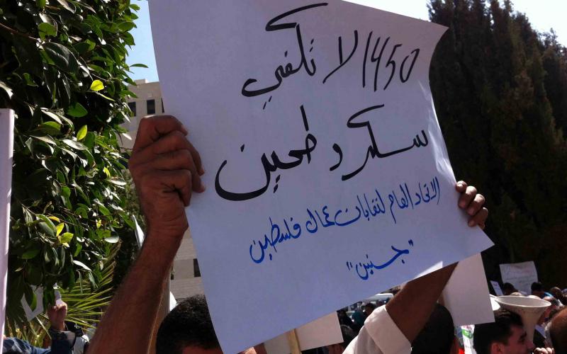 بالصور.. العمال يرفضون الحد الأدنى للأجور