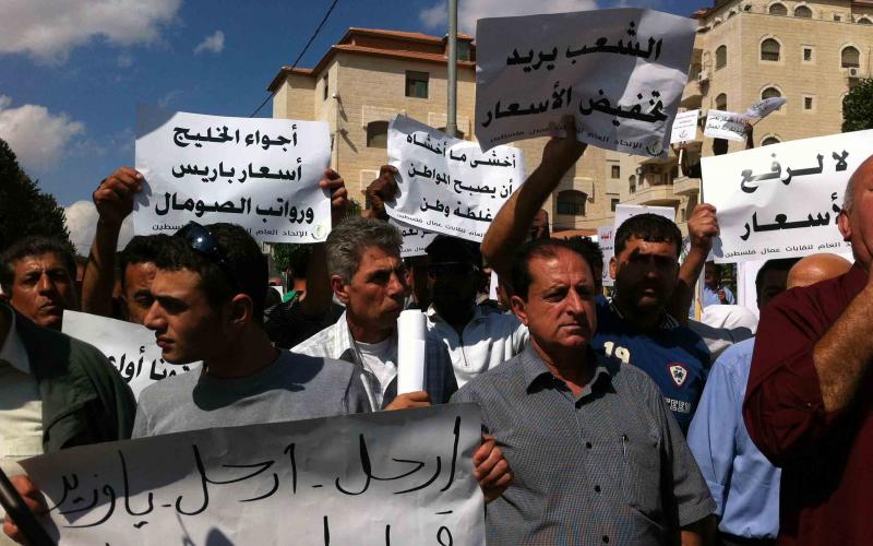 بالصور.. العمال يرفضون الحد الأدنى للأجور