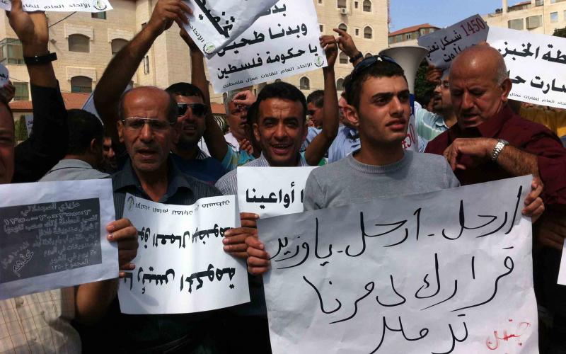 بالصور.. العمال يرفضون الحد الأدنى للأجور