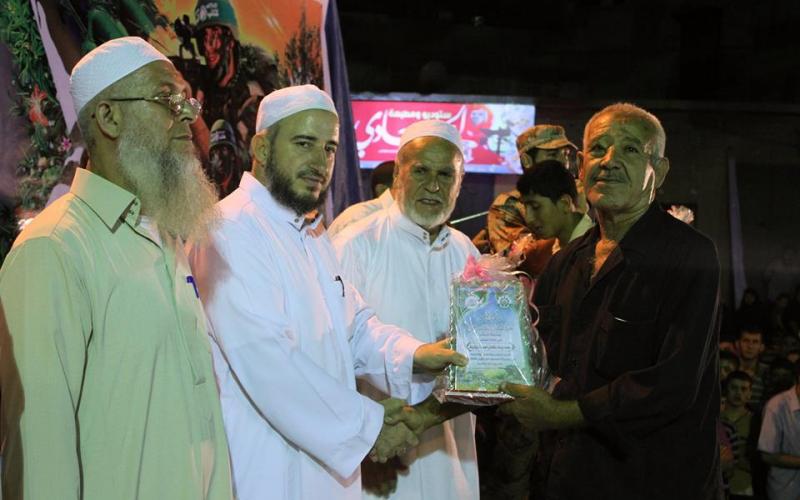 صور: حماس تكرّم عوائل شهداء العصف المأكول بجباليا البلد‎
