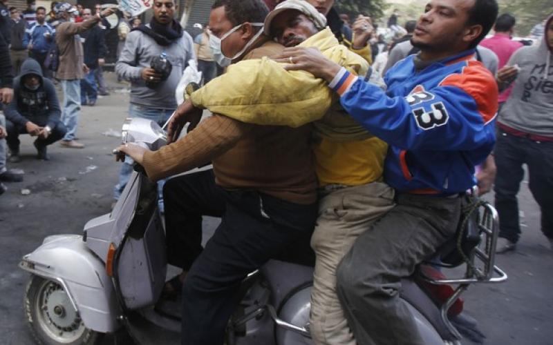 بالصور.. قتلى وجرحى ومعارك بميدان التحرير