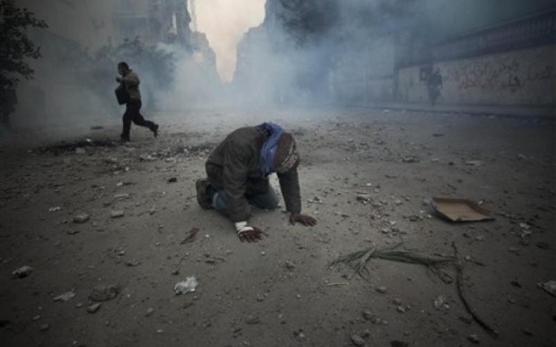 بالصور.. قتلى وجرحى ومعارك بميدان التحرير