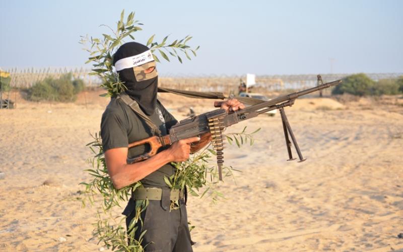 بالصور:"المجاهدين"تجري مناورة بذكرى السجيل