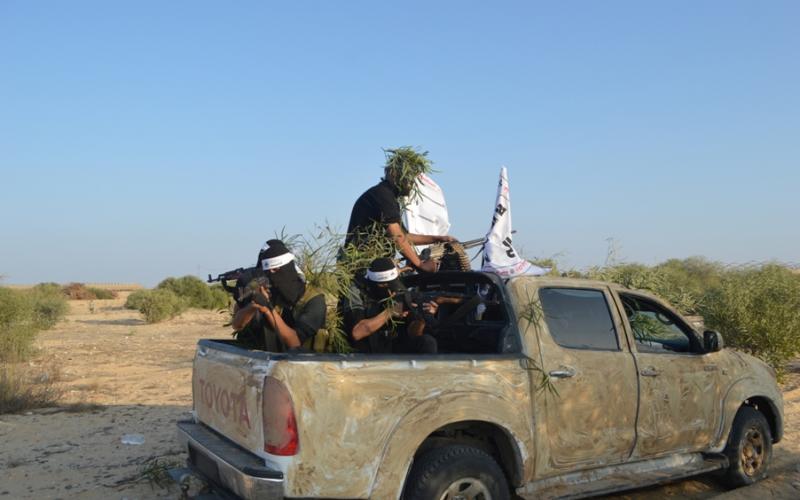 بالصور:"المجاهدين"تجري مناورة بذكرى السجيل