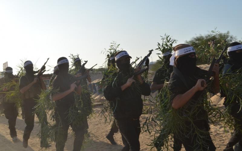 بالصور:"المجاهدين"تجري مناورة بذكرى السجيل