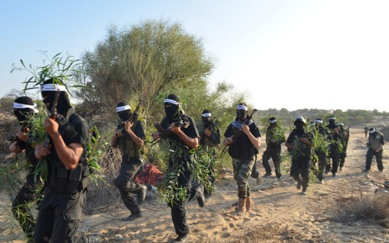 بالصور:"المجاهدين"تجري مناورة بذكرى السجيل