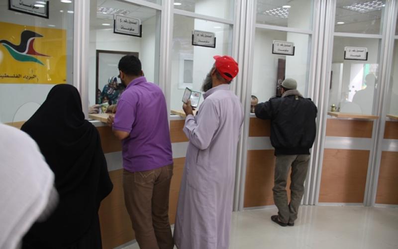 صور: الوزير العيسوي يفتتح بريد خانيونس