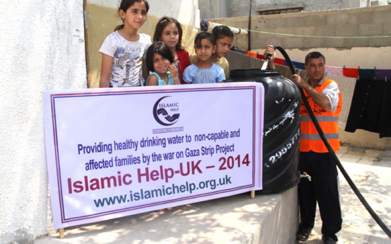 بالصور: الفلاح الخيرية تختتم توزيع مياه الشرب