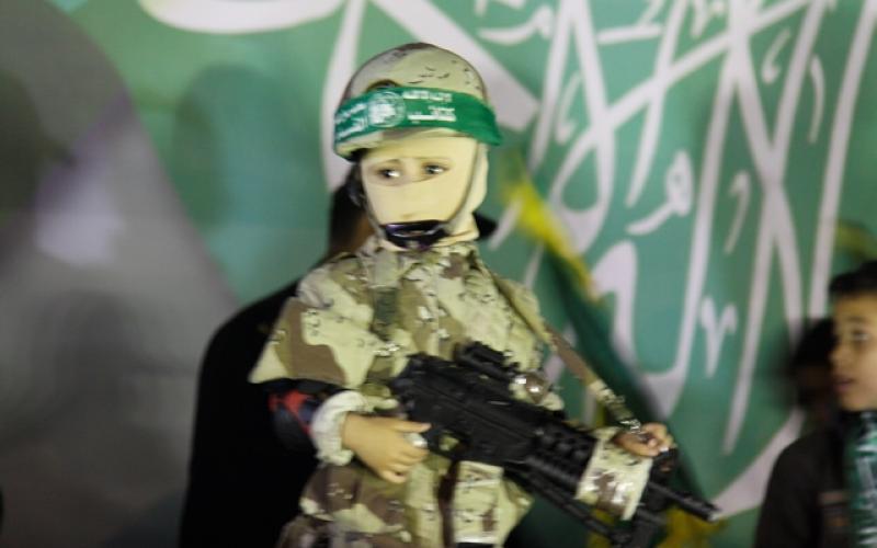صور : آلاف بحفل تكريم شهداء رفح وبحضور قادة حماس والقسام