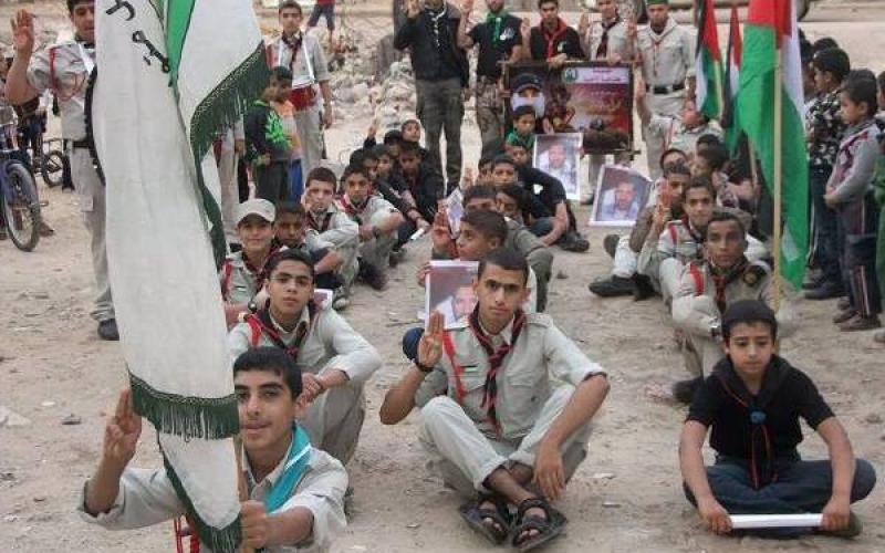 بالصور:مسير كشفي بذكرى "السجيل" بالوسطى